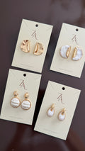 Aretes dorados elegantes
